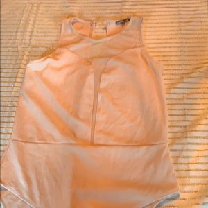 Pink leotard with mesh low cut